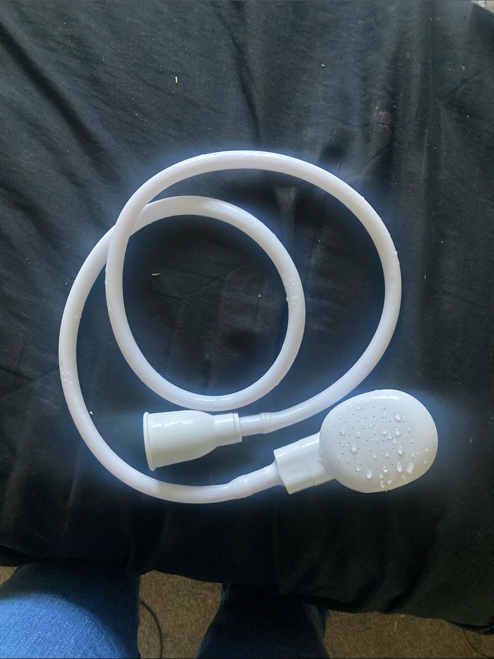 White Handheld Shower Head with Flexible Hose